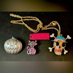Betsey Johnson Bundle deals!!
Two brooches and One blinged out skull necklace